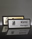 Picture of Imprinted Metal Name Badge With Black Frame - 3 x 1 Inch