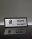 Picture of Imprinted Metal Name Badge With Black Frame - 3 x 1 Inch