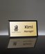Picture of Imprinted Metal Name Badge With Black Frame - 3 x 1.5 Inch