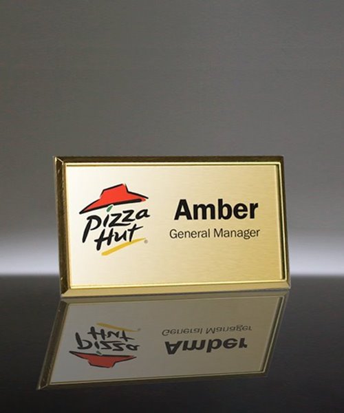 Picture of Imprinted Metal Name Badge With Gold Frame - 3 x 1.5 Inch