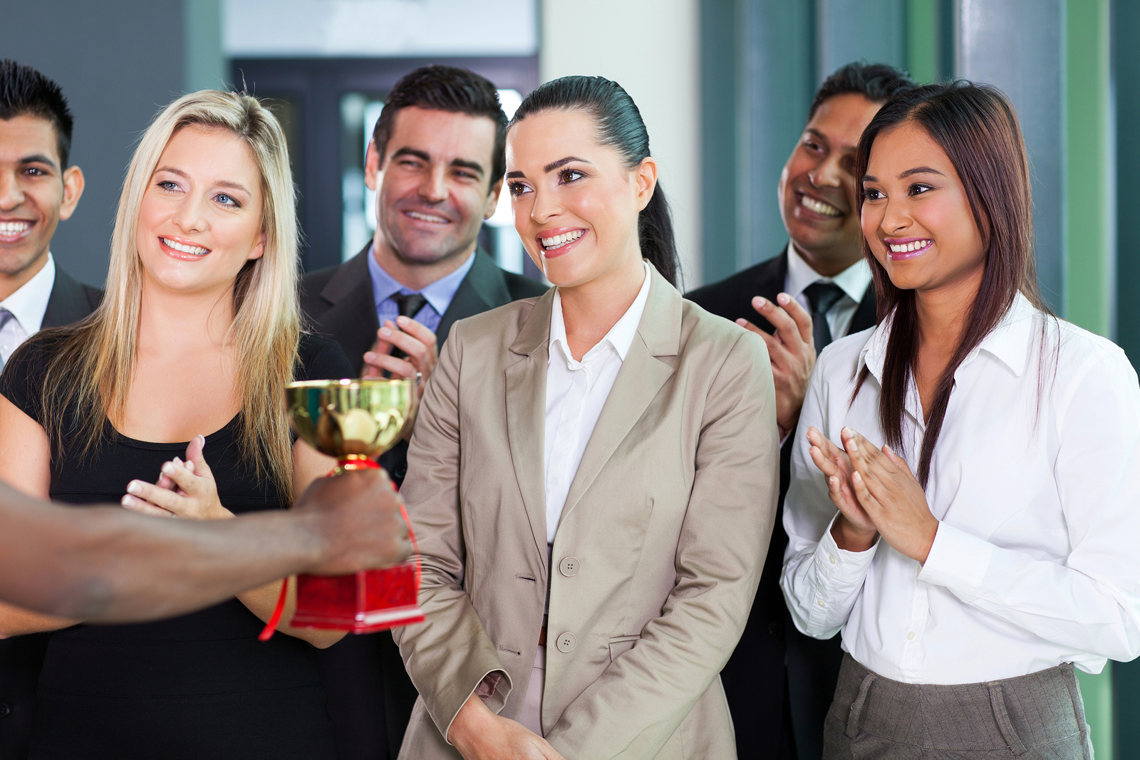 employee being recognized with award